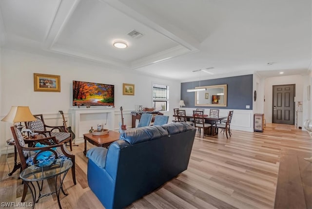 living room with light hardwood / wood-style flooring