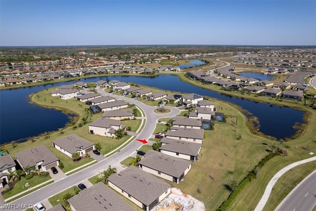 drone / aerial view with a water view