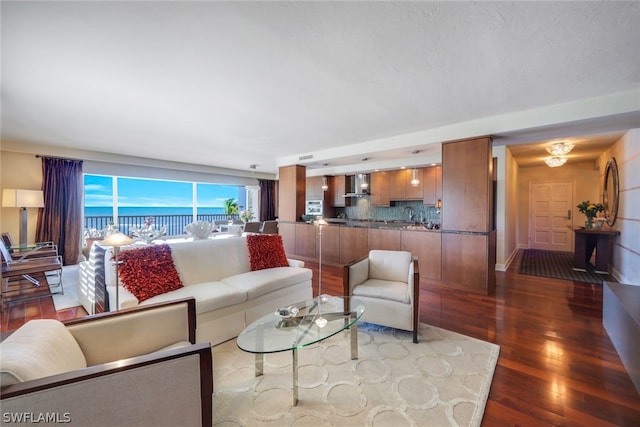 living room with dark hardwood / wood-style floors