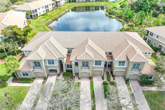 drone / aerial view with a water view