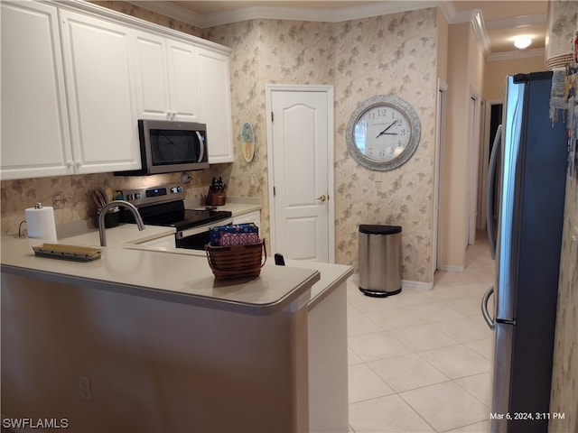 kitchen with ornamental molding, appliances with stainless steel finishes, light tile flooring, tasteful backsplash, and white cabinetry