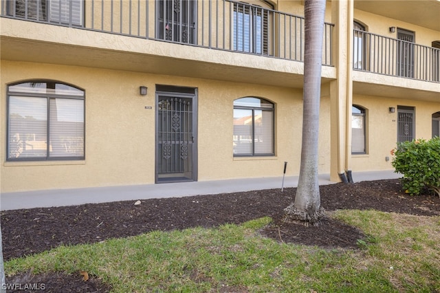 doorway to property with a balcony