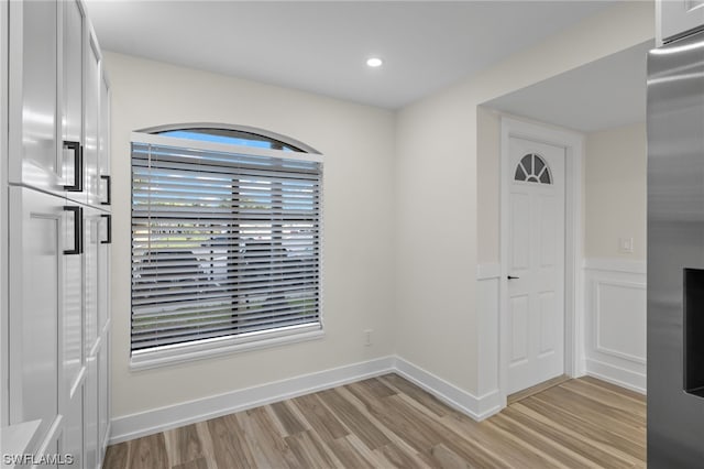 empty room featuring light hardwood / wood-style floors