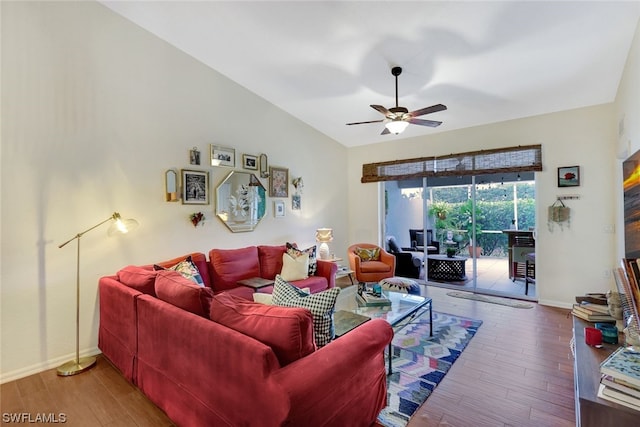 living room featuring ceiling fan and hardwood / wood-style flooring