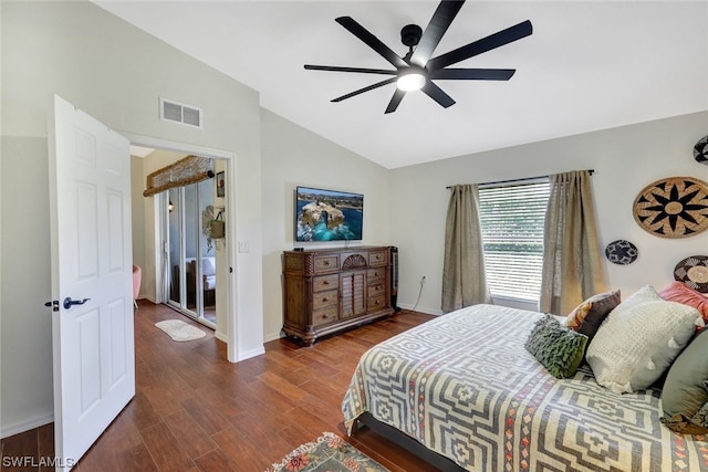 bedroom featuring dark hardwood / wood-style floors, ceiling fan, and vaulted ceiling