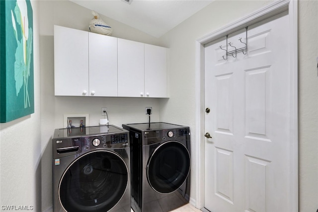 laundry room featuring hookup for a washing machine, independent washer and dryer, hookup for an electric dryer, and cabinets