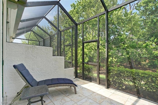 unfurnished sunroom featuring a pool