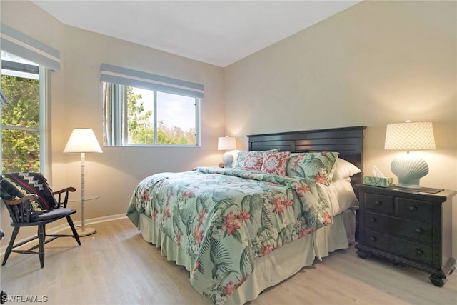 bedroom with light hardwood / wood-style flooring