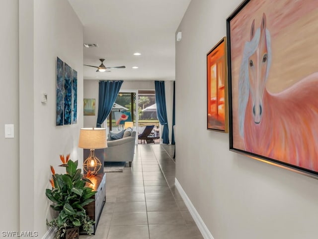 hallway with light tile flooring