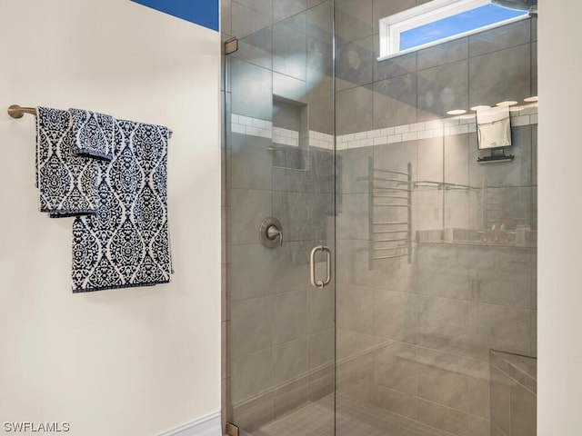 bathroom featuring walk in shower