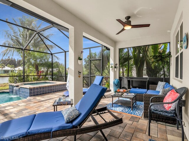 sunroom / solarium with ceiling fan