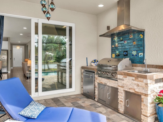 view of terrace featuring area for grilling and sink