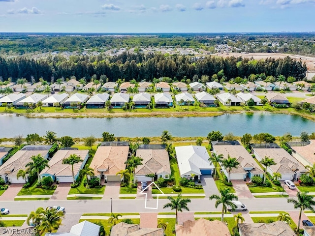 drone / aerial view with a water view