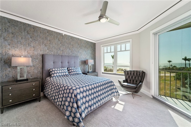 bedroom featuring light carpet, access to exterior, ornamental molding, and ceiling fan