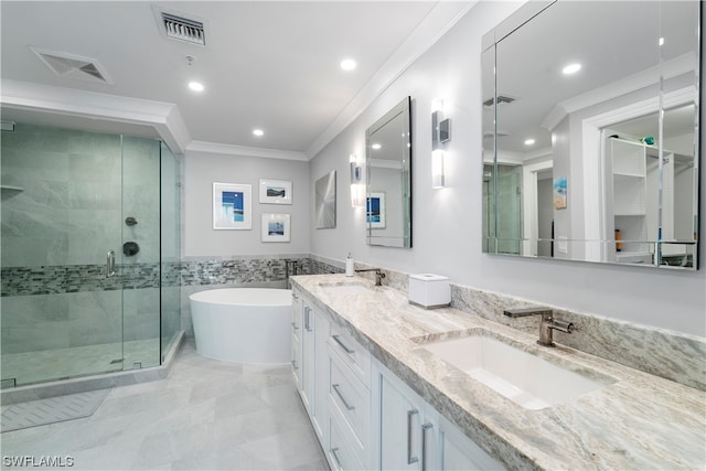 bathroom with crown molding, tile floors, dual bowl vanity, and plus walk in shower