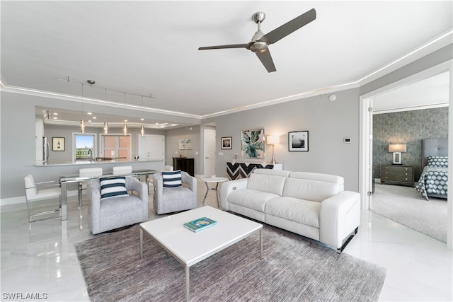 tiled living room featuring ceiling fan and ornamental molding