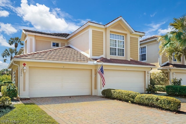 view of property featuring a garage