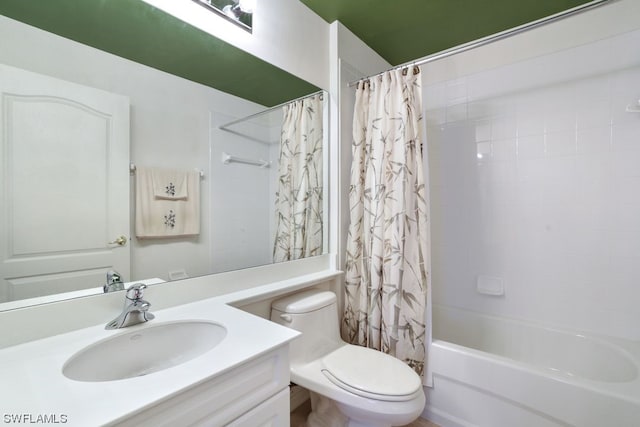 full bathroom featuring toilet, shower / tub combo, and vanity