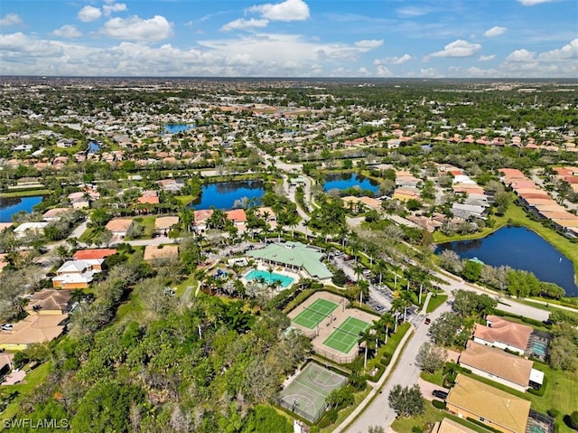 drone / aerial view with a water view