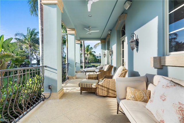 balcony featuring ceiling fan