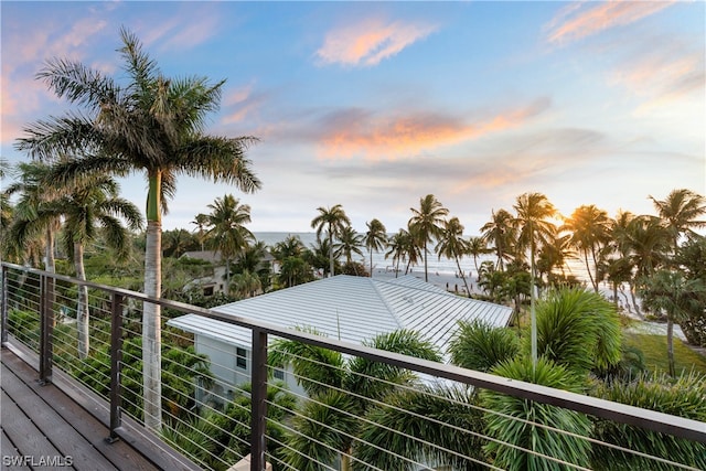 view of balcony at dusk