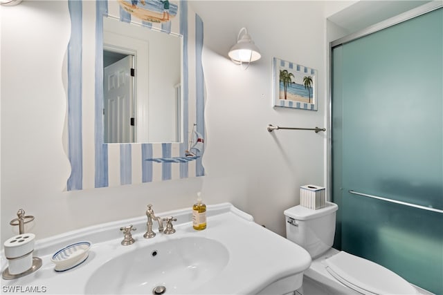 bathroom with sink and toilet