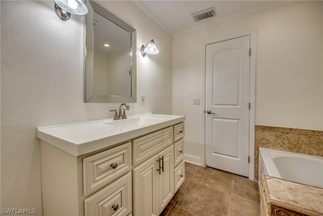 bathroom with crown molding, tile floors, a bathing tub, and vanity