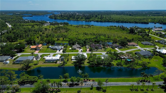 birds eye view of property featuring a water view