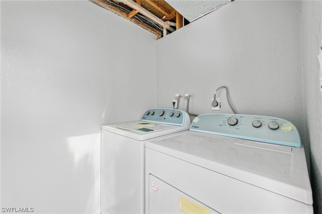 laundry area with washer and dryer