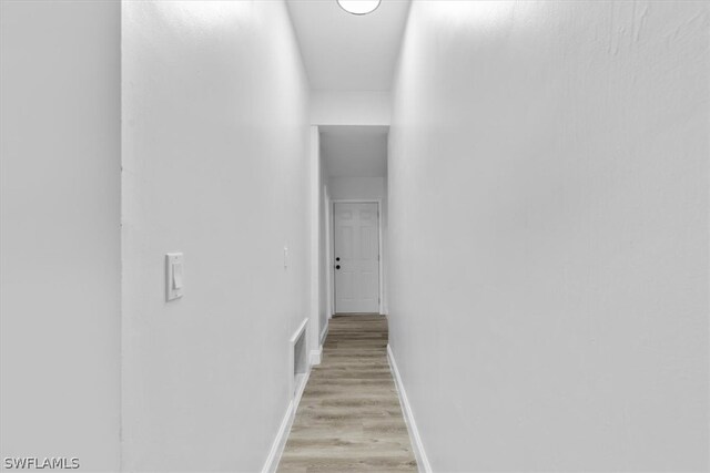 hall featuring light hardwood / wood-style flooring