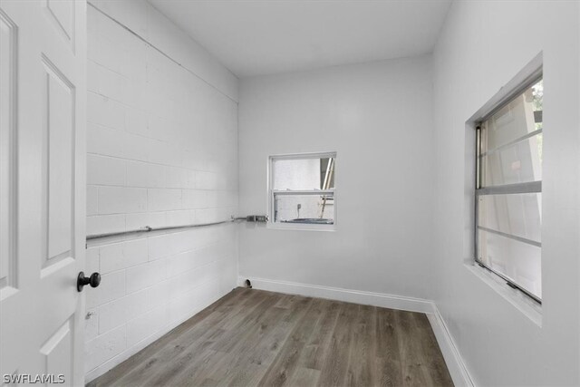 spare room with hardwood / wood-style floors