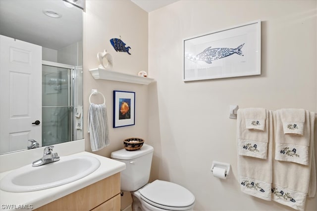 bathroom featuring toilet and oversized vanity