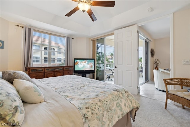 carpeted bedroom with ceiling fan, multiple windows, and access to outside