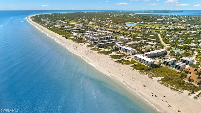 aerial view featuring a water view and a beach view