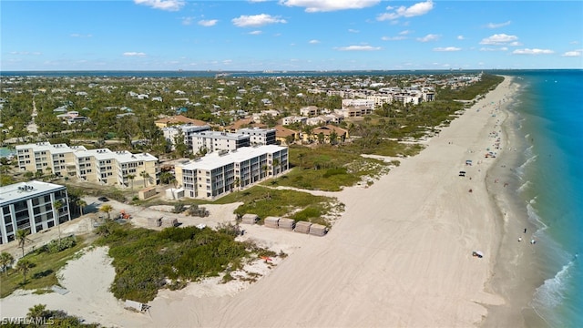 bird's eye view with a water view and a view of the beach