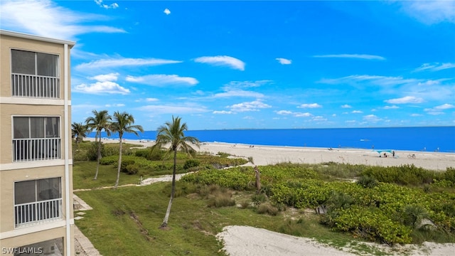 property view of water featuring a beach view