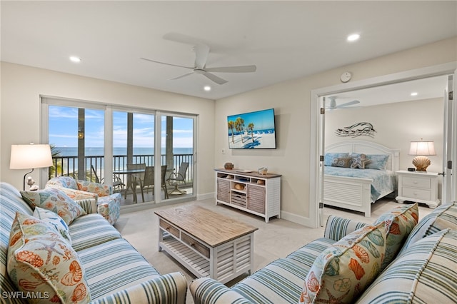 living room featuring ceiling fan