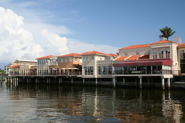 exterior space with a water view