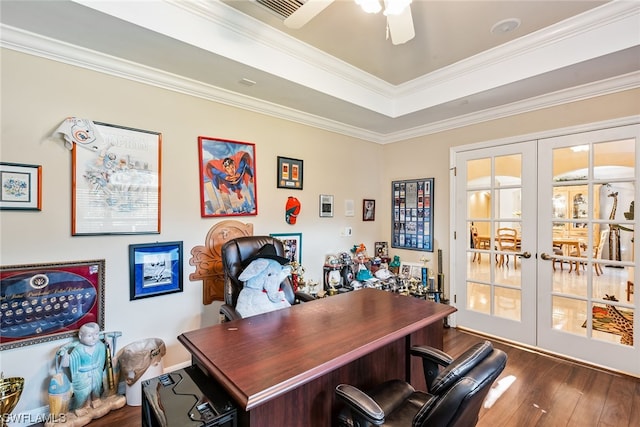 office space featuring dark hardwood / wood-style floors, ornamental molding, ceiling fan, and french doors