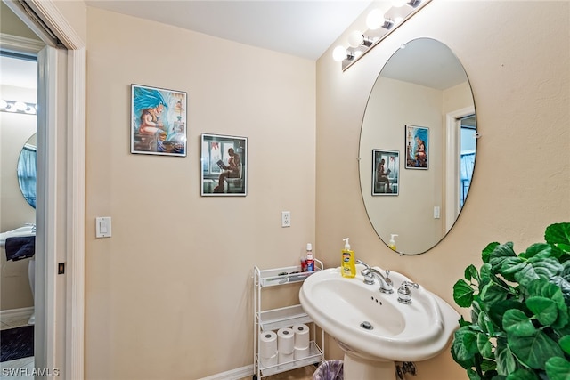 bathroom with sink and tile flooring