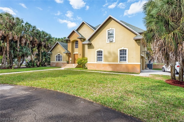 front of property featuring a front lawn