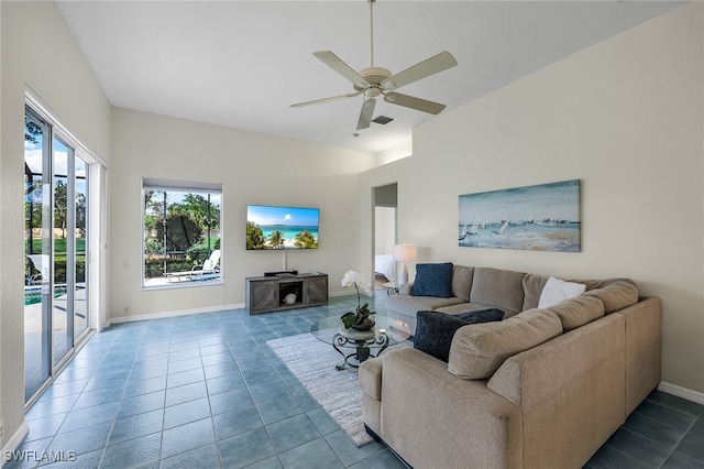 tiled living room featuring ceiling fan