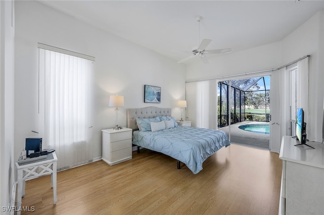 bedroom featuring access to exterior, ceiling fan, and light wood-type flooring