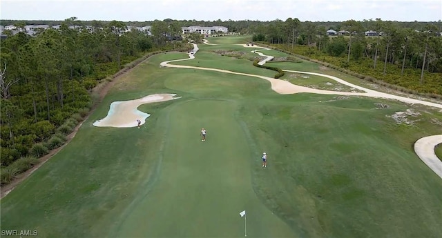 birds eye view of property featuring golf course view