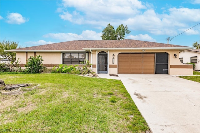 ranch-style home featuring a front yard and a garage