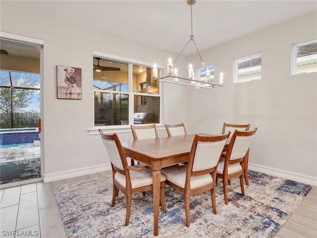 dining room with a notable chandelier