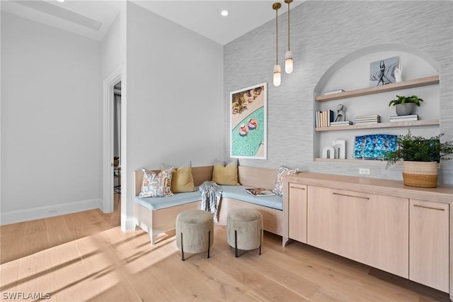 living area with light hardwood / wood-style flooring