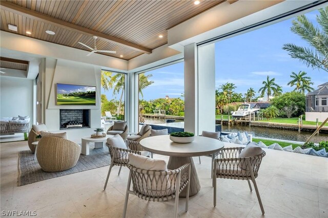 view of patio / terrace featuring ceiling fan