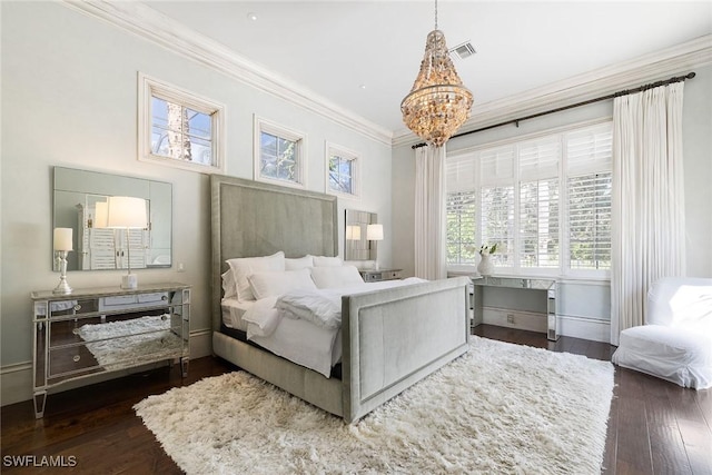 bedroom with ornamental molding, dark wood-type flooring, and a notable chandelier
