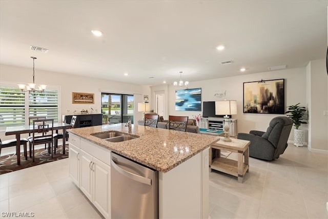 kitchen featuring pendant lighting, a notable chandelier, white cabinets, dishwasher, and sink